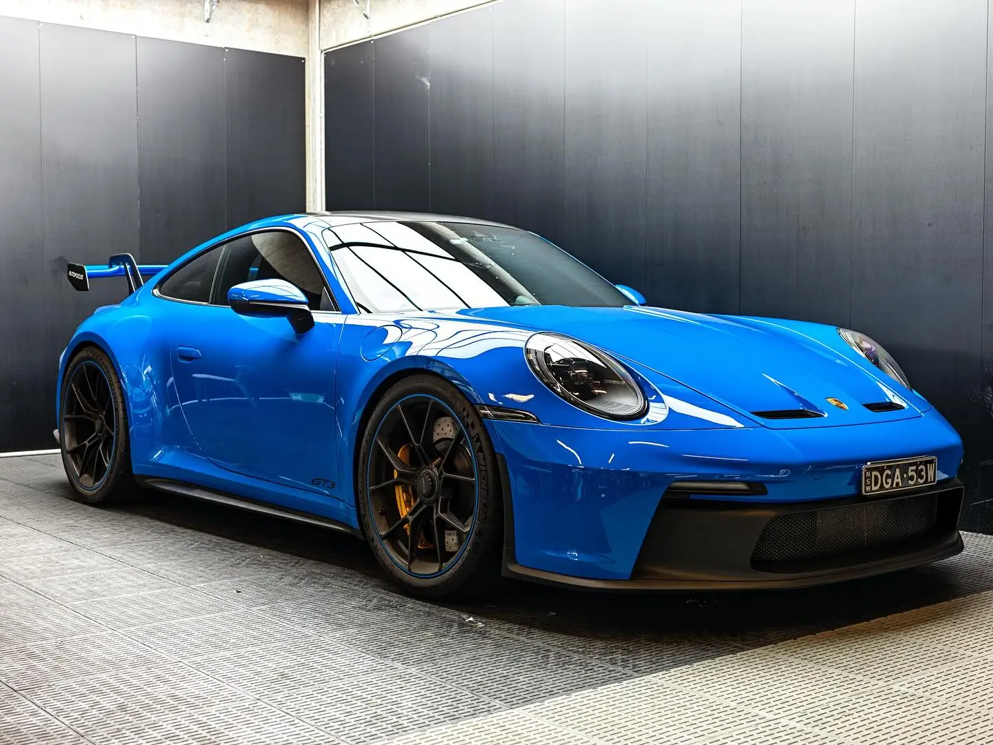 Shark Blue Porsche GT3 with full paint protection film for cars package and carbon fibre roof wrap
