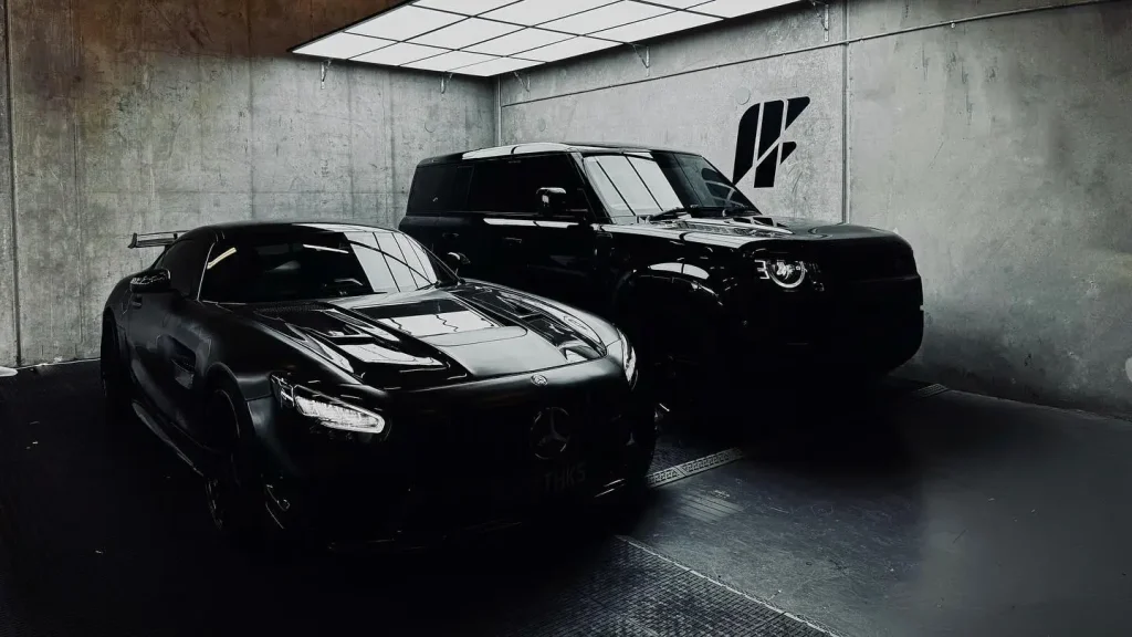 Land Rover Defender V8 and Mercedes AMG GT at Sydney workshop offering graphene coating and ceramic protection services
