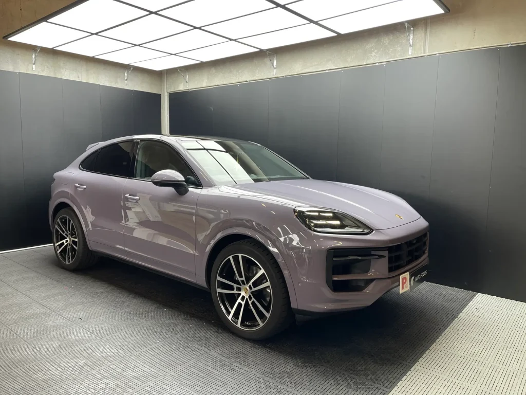 Porsche Cayenne wrapped in AX Provence Purple vinyl wrap showing premium colour protection and aesthetic enhancement