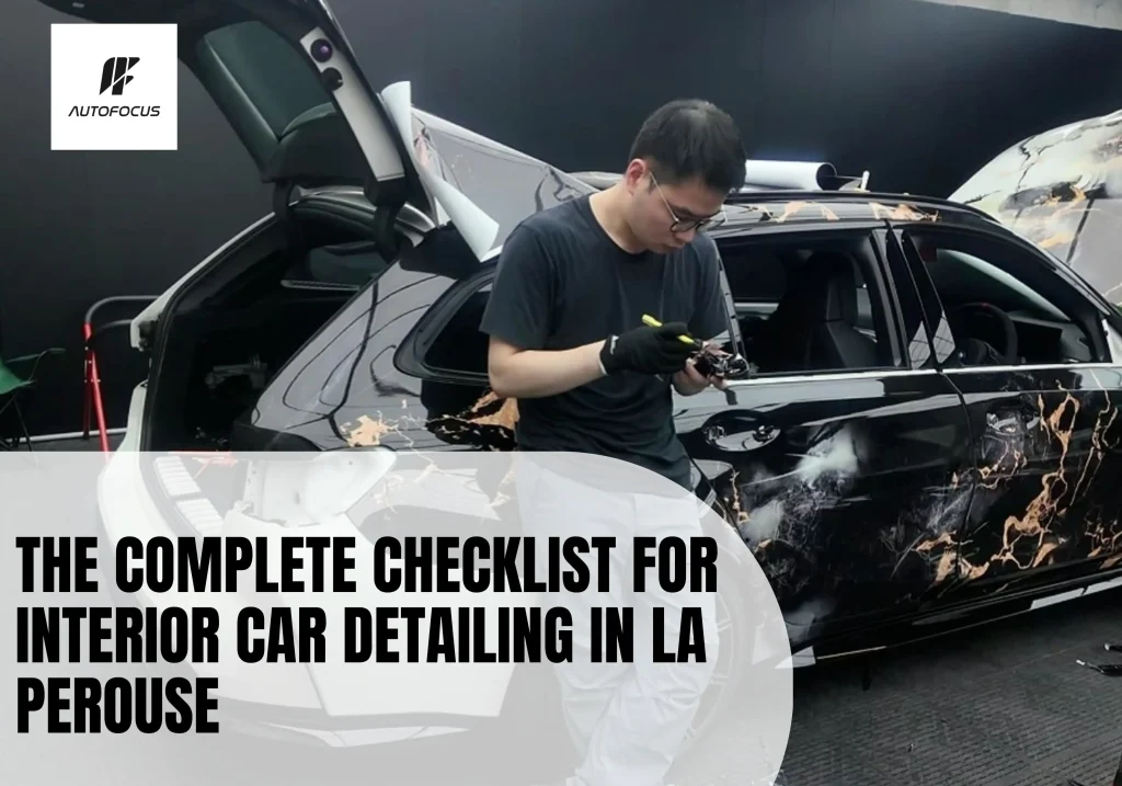 Professional vinyl wrap application for interior car detailing in La Perouse showing precision wrapping technique on a luxury vehicle exterior