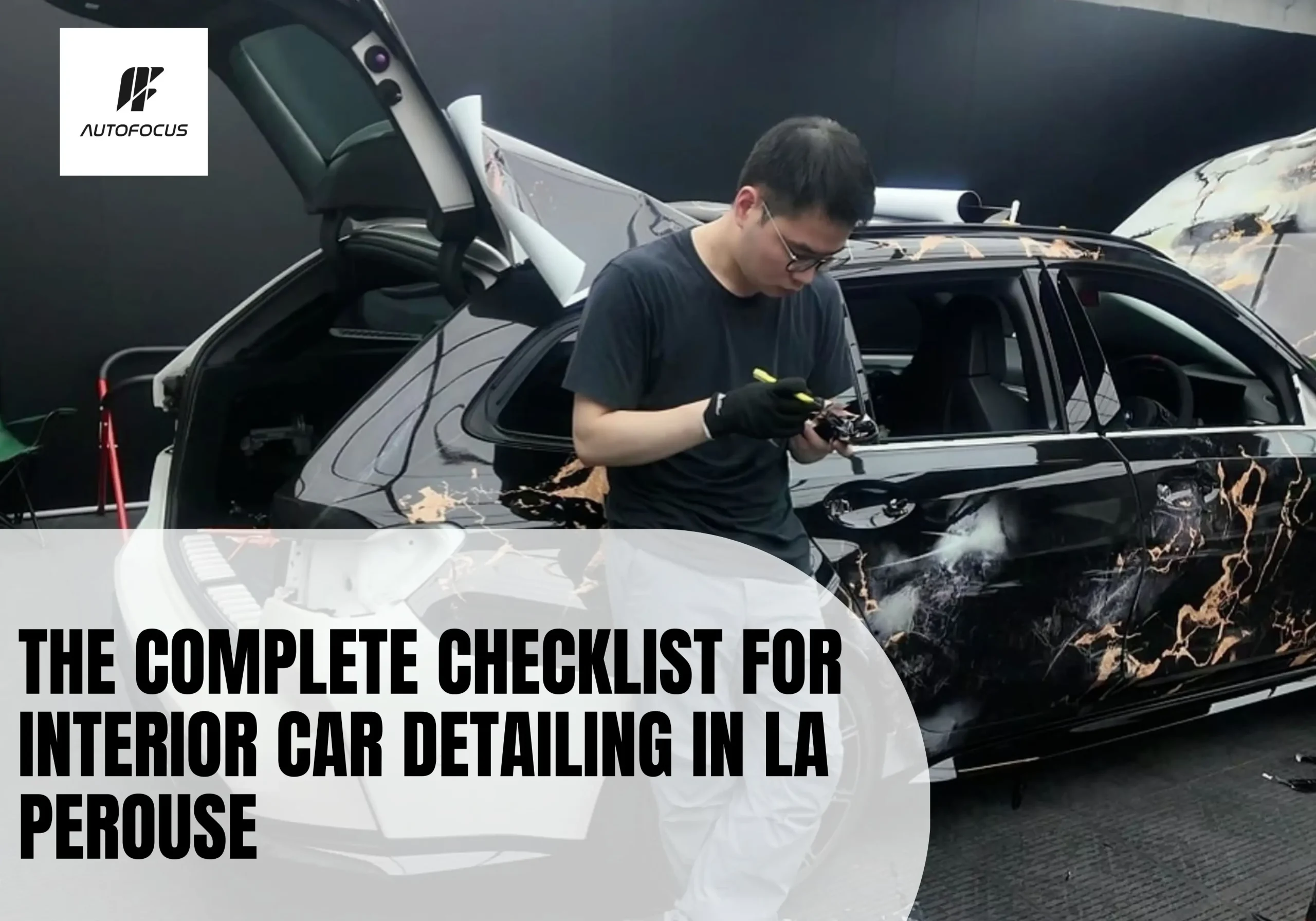 Professional vinyl wrap application for interior car detailing in La Perouse showing precision wrapping technique on a luxury vehicle exterior