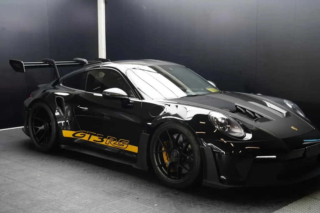 Yellow GT3 RS custom decal detail work compared to full car wraps Sydney complete coverage solutions